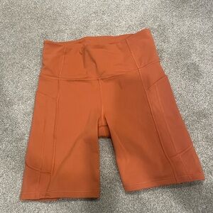 Athleta Women's High-Rise Orange Bike Shorts